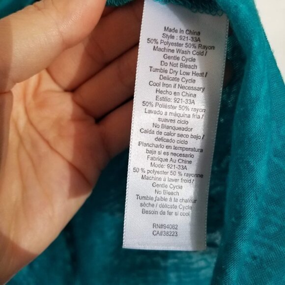 Language Embroidered Cutout Eyelet Sleeveless Top - Picture 10 of 11